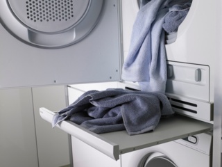 Сушильная машина вибрирует при работе. Как исправить?