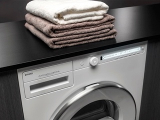 Сушильная машина вибрирует при работе. Как исправить?